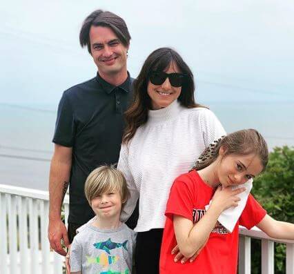 Stephanie Eitel with her husband, Sam Farrar and children, Vesper Pearl Farrar and Flynn Roscoe Farrar.